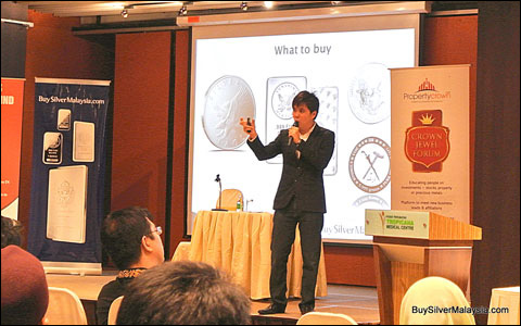 KH delivering a talk on the surging market demand for silver.